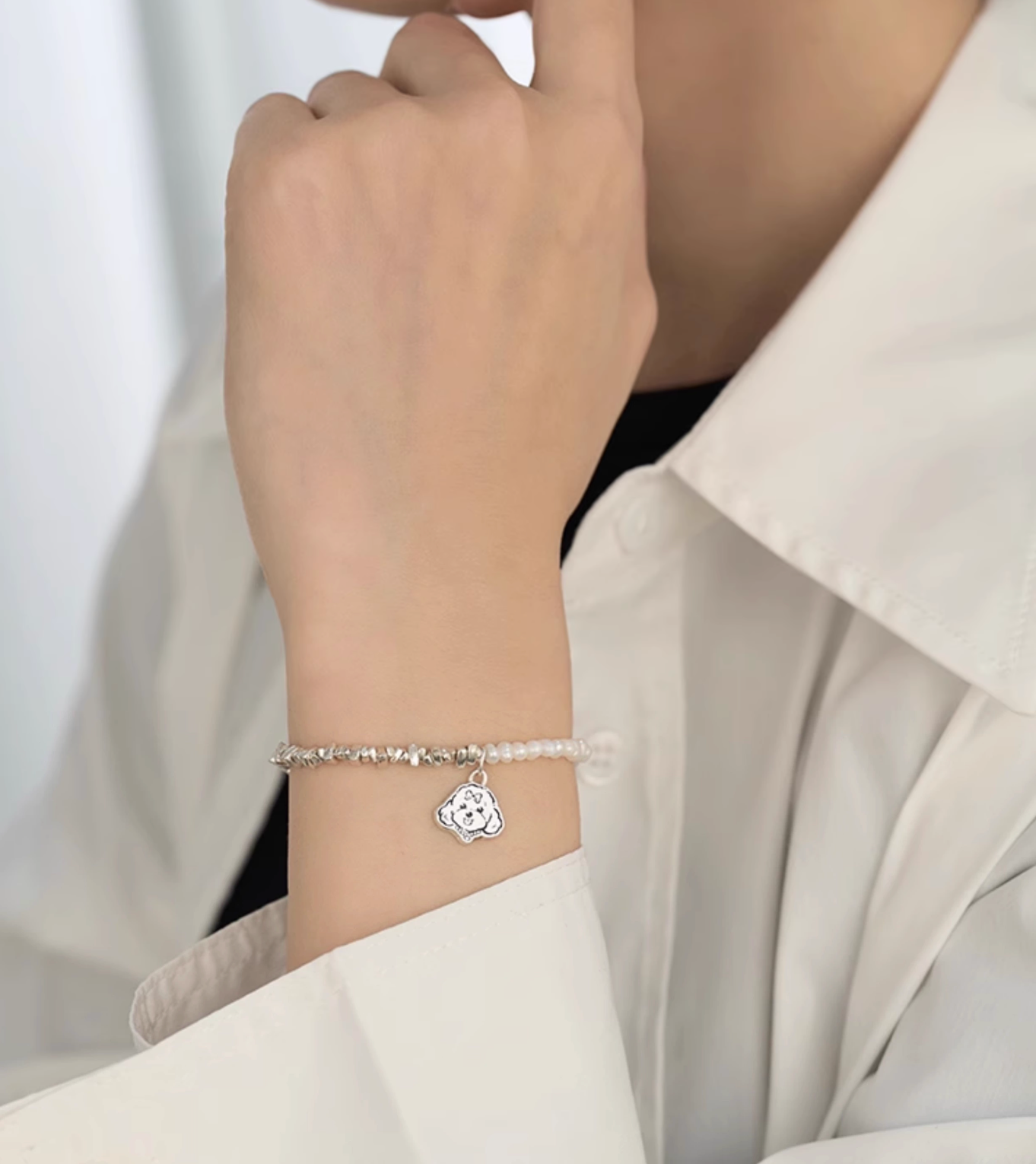 Wrist wearing our Dog Pearl Pet Face Bracelet